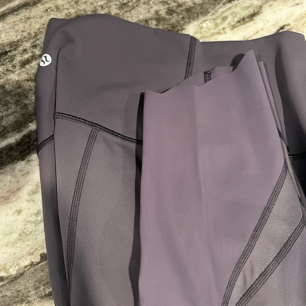 Lululemon leggings gently used size 6. Mesh bottom with cut edge